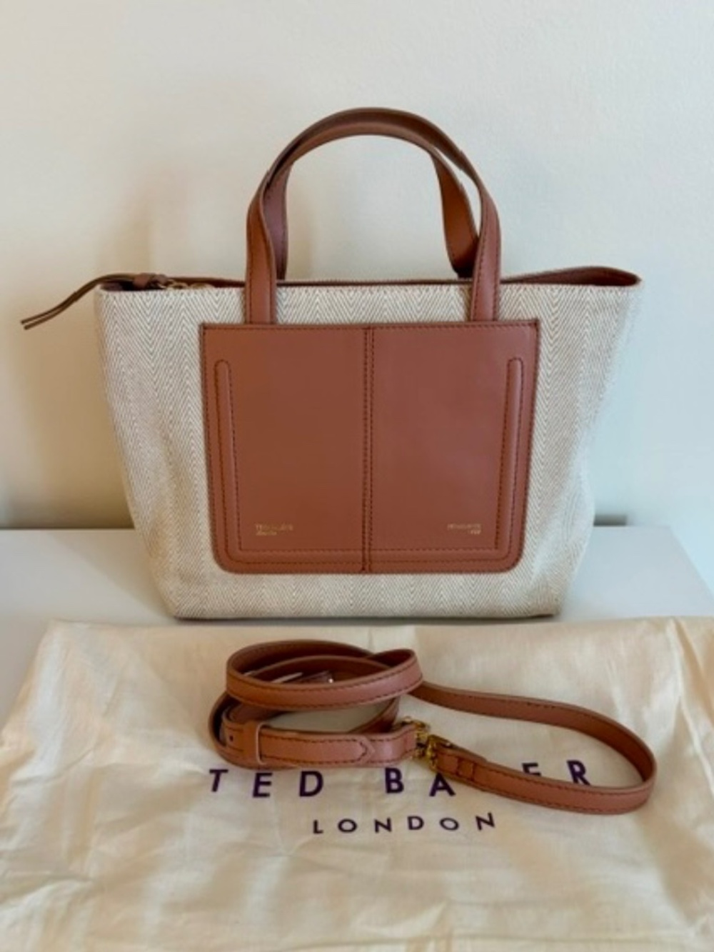Ted Baker canvas and leather tote bag featuring a herringbone pattern